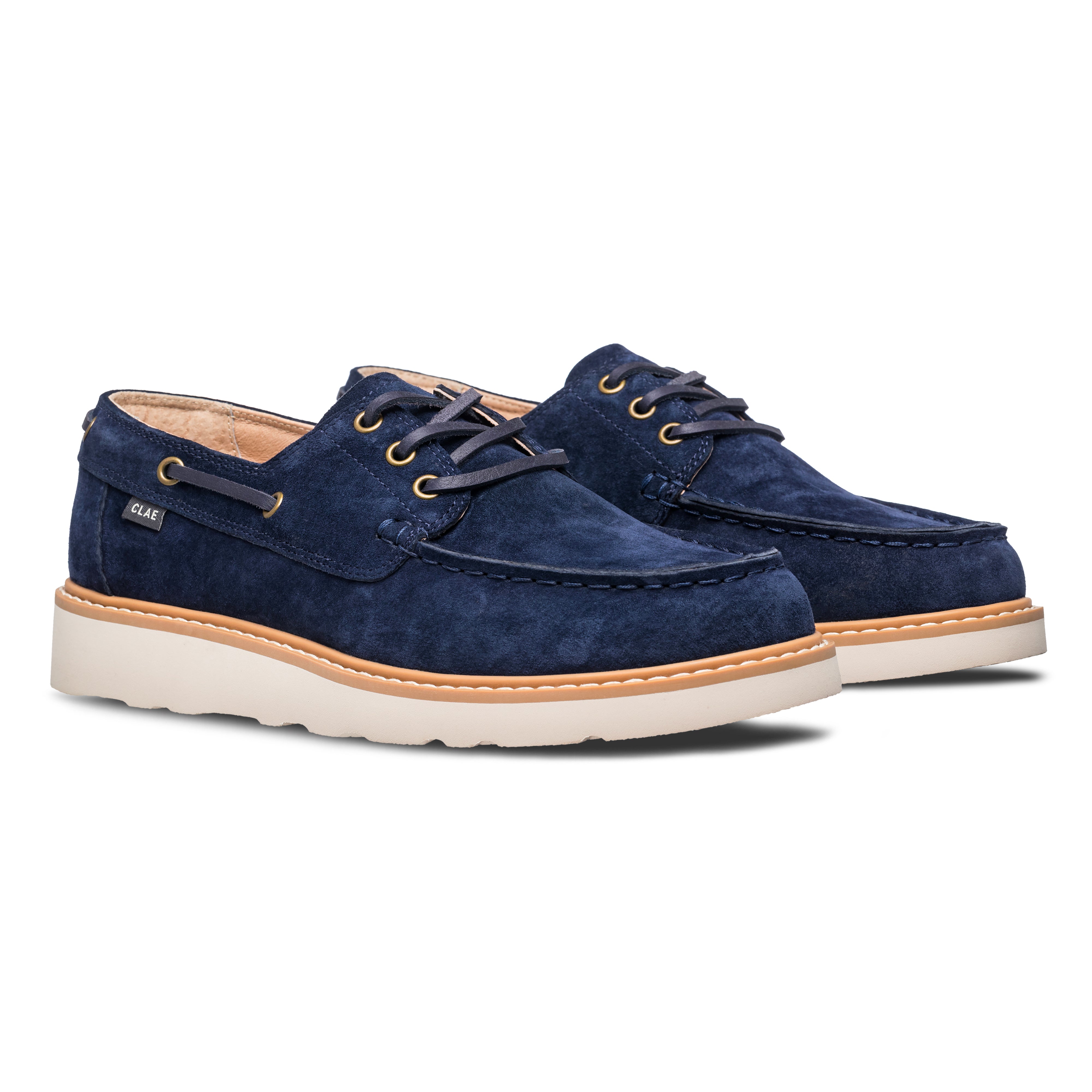Three-quarter view of Carter Heritage Collection shoe, highlighting suede upper and classic boat shoe design.