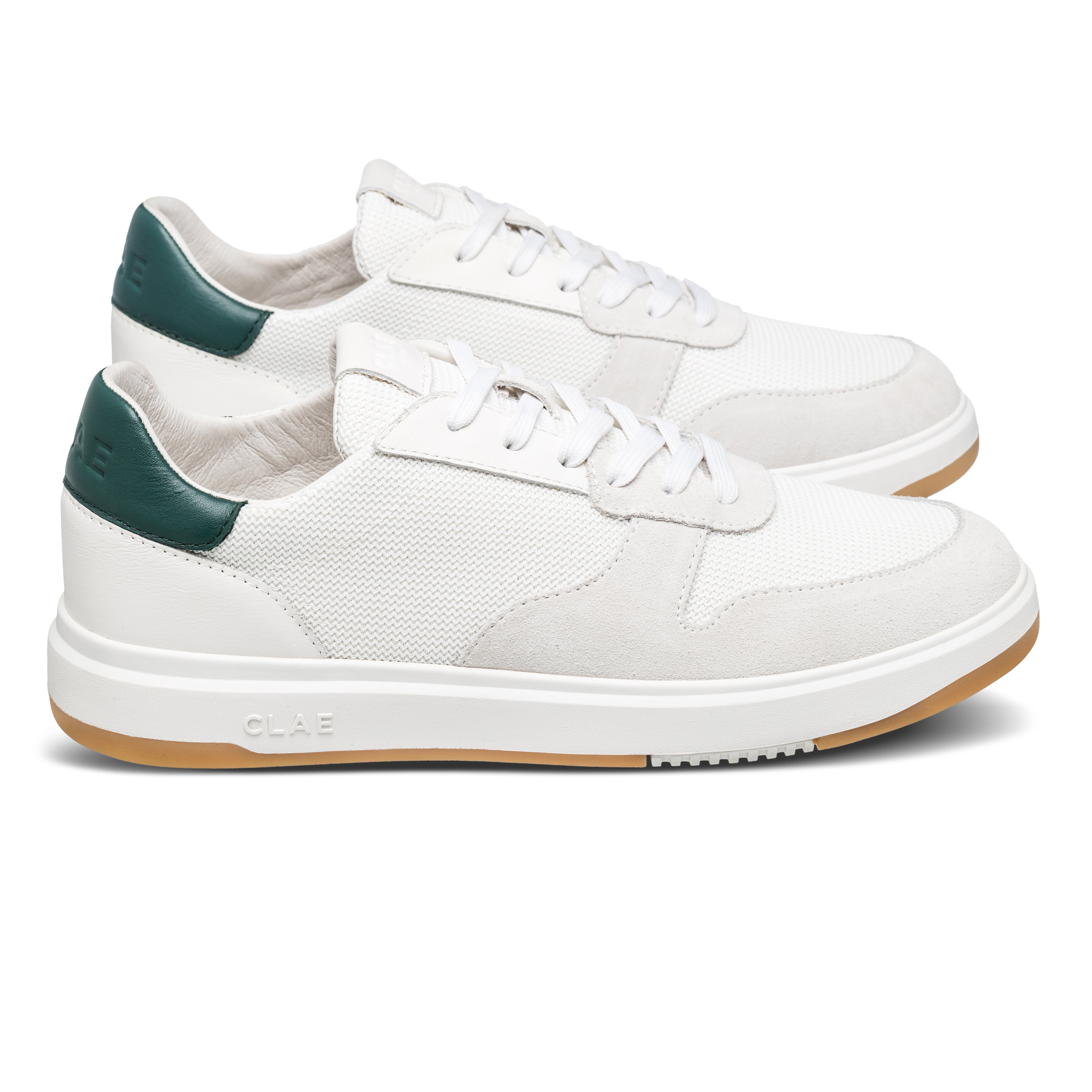 Moses sneaker in White Pine Needle with Italian leather, suede, and recycled mesh upper, side view showing refined silhouette and timeless design.