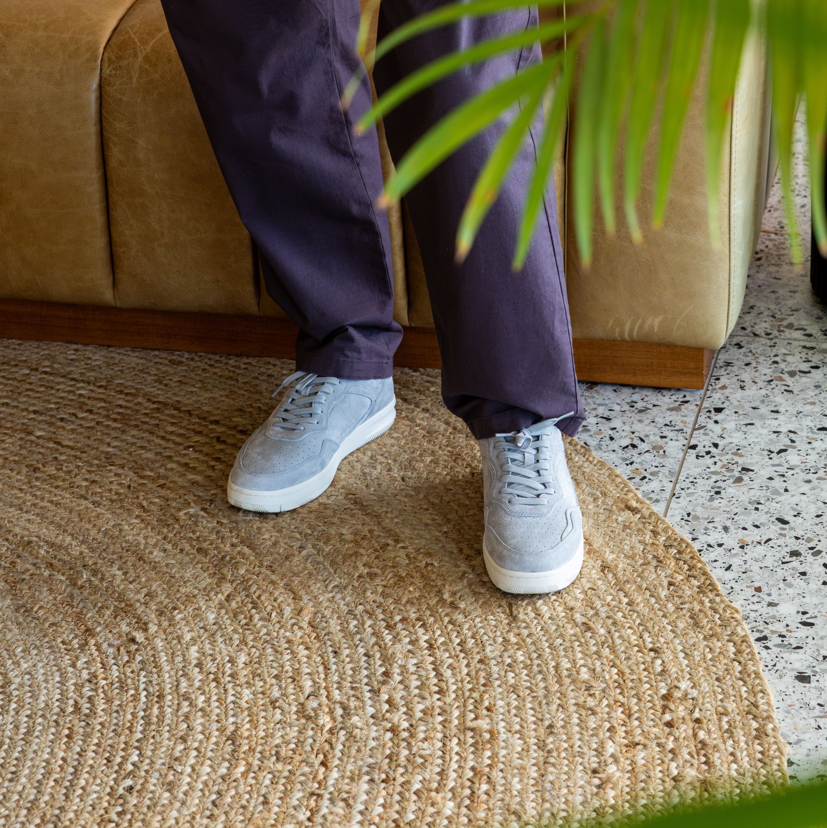 Haywood court shoe in Quiet Gray Suede worn in casual lifestyle setting, highlighting premium materials and refined detailing.