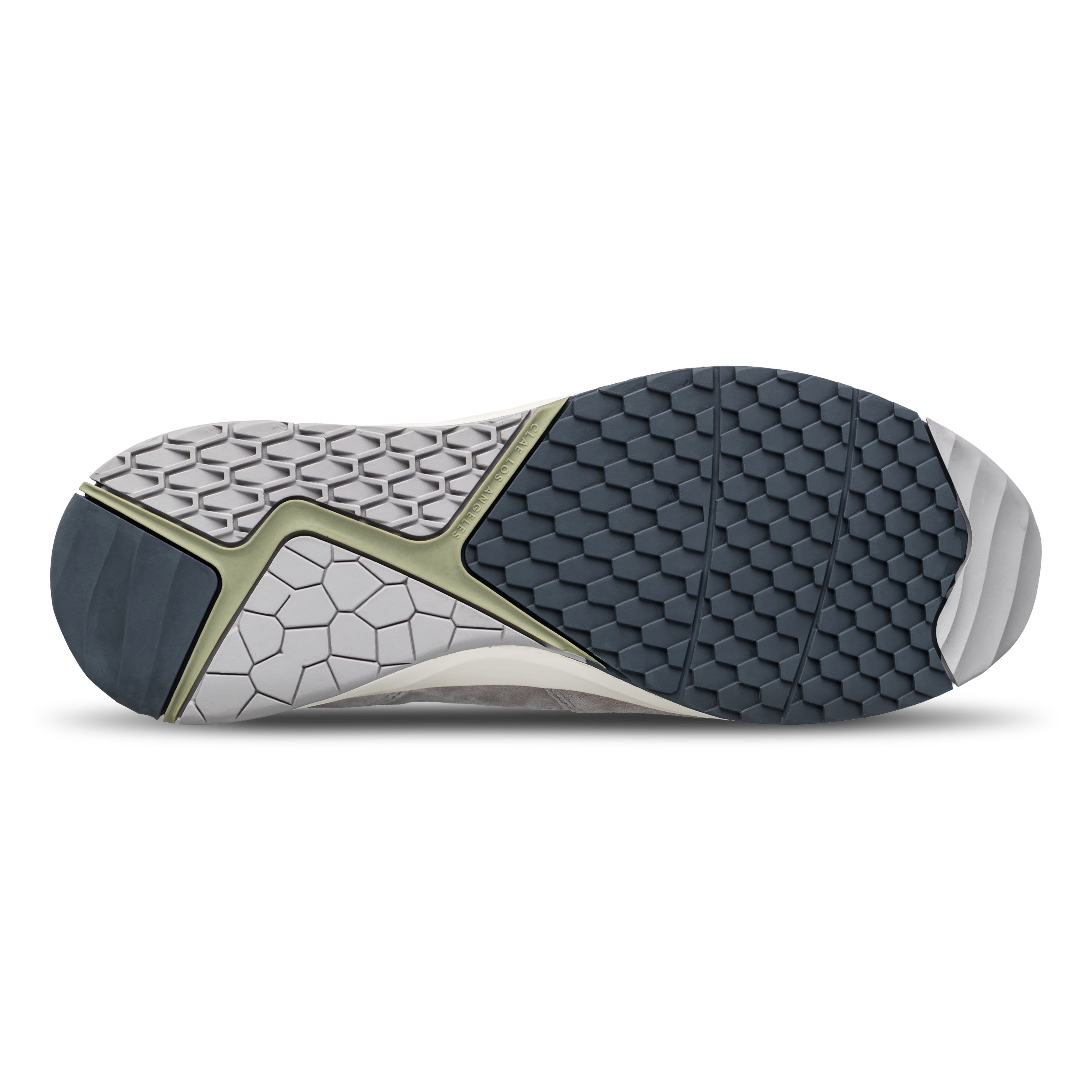 Zuma runner in Quiet Gray Tea with Desert Track (DT) outsole featuring 3D natural design elements inspired by snake scales, dunes, and rocks, sole view.