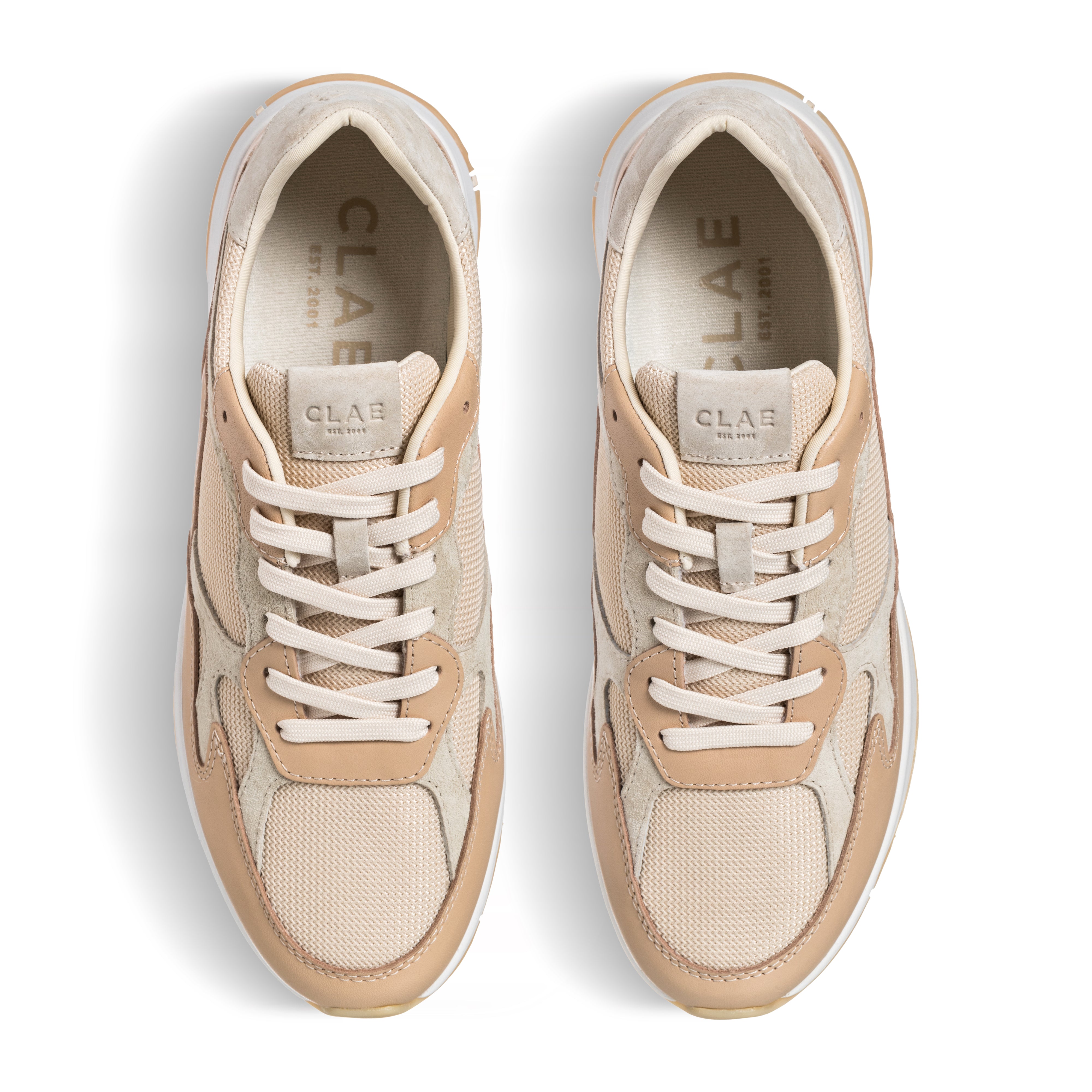 Top view of Zuma runner in Vegtan Wood Ash, showing leather, suede, and recycled mesh upper with lace details.